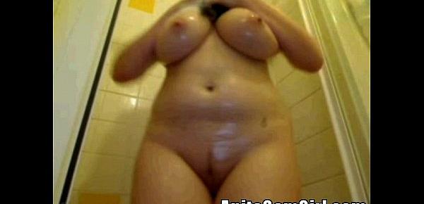  Natural busty blonde takes a shower